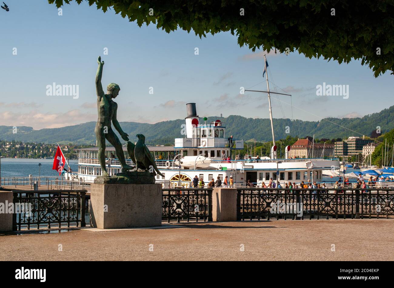 Stadt Rapperswil paddle steamer at Burkliplatz with statue of Ganymede in foreground Stock Photo
