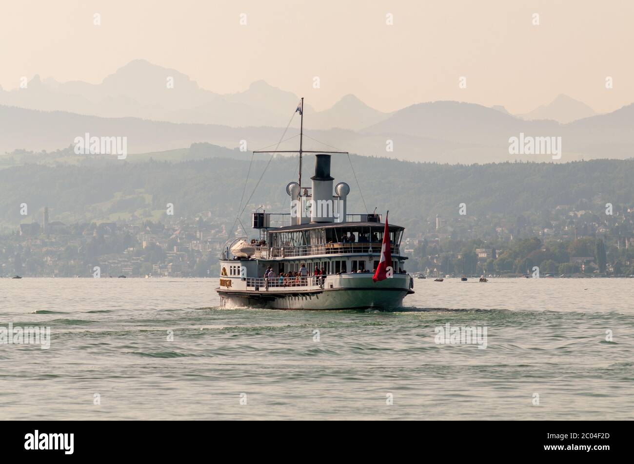 Stadt Rapperswil paddle steamer on Lake Zurich with the Glarner Alps in the background Stock Photo