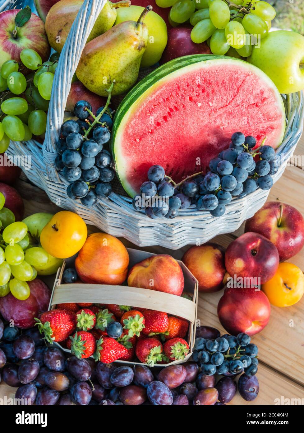 Variety of fresh ripe fruits in the garden. Balanced diet Stock Photo ...