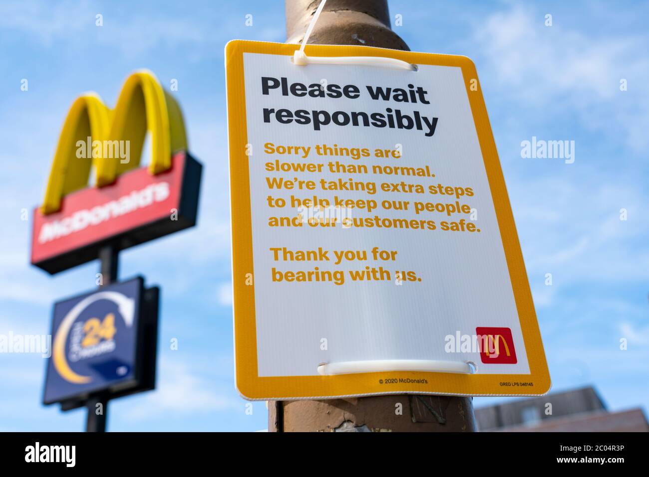 Edinburgh, Scotland, UK. 11 June 2020. Sign outside McDonalds drive-thru restaurant in Edinburgh warning about slow service times during Covid-19 re-opening of restaurants during lockdown relaxation. Iain Masterton/Alamy Live News Stock Photo