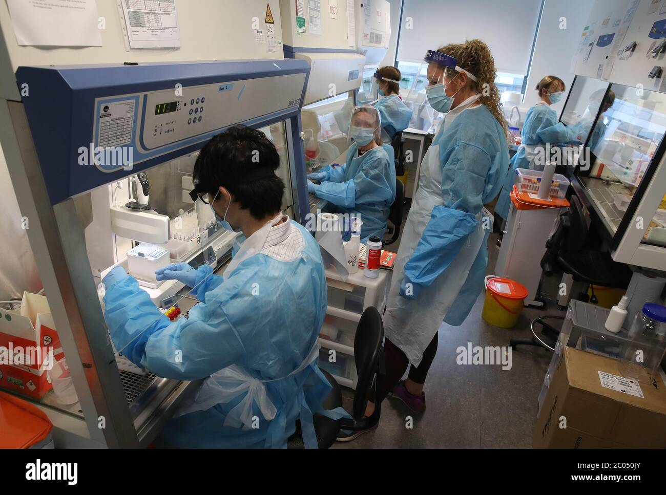 Scientists working lighthouse laboratory queen elizabeth university ...