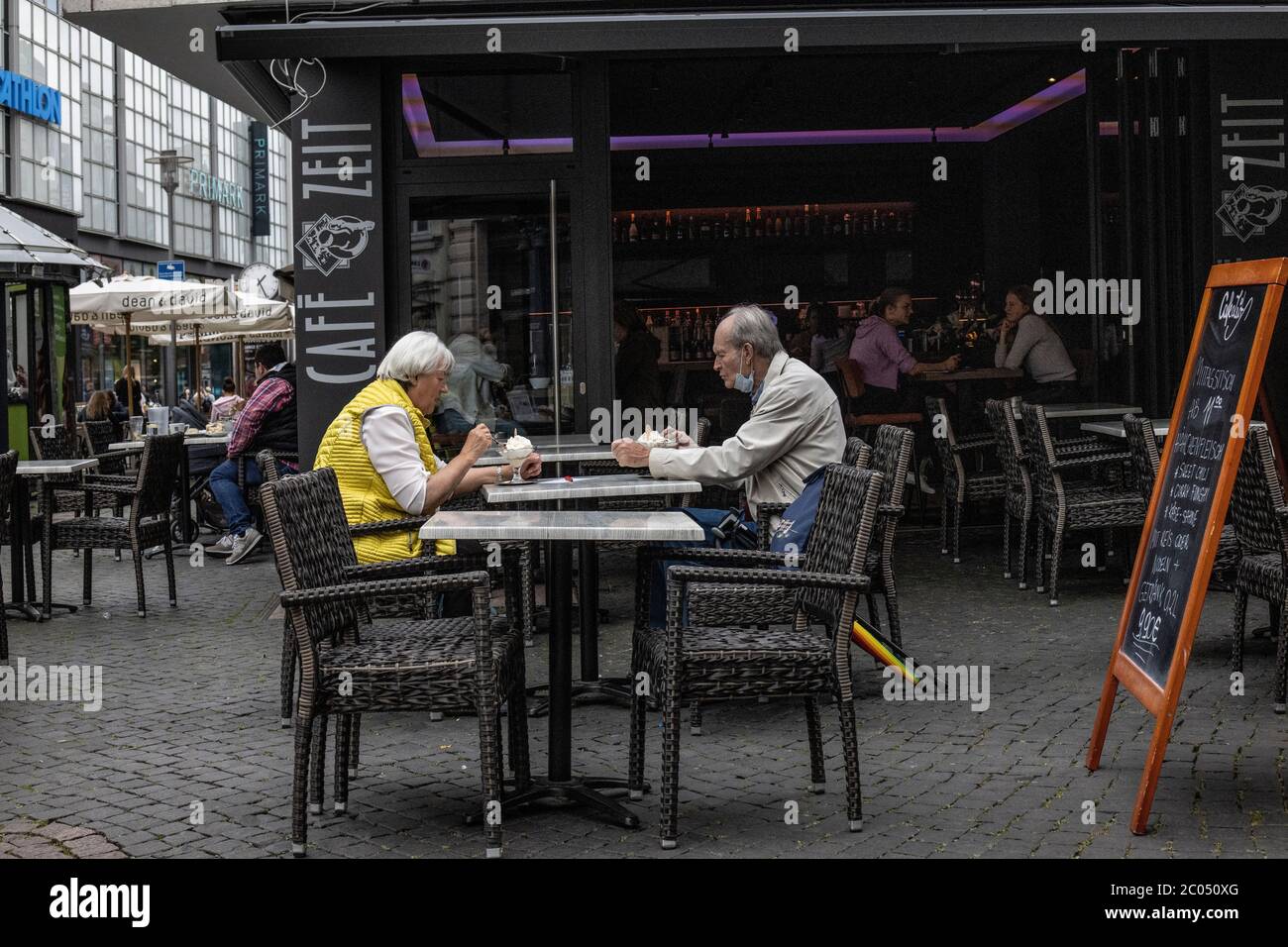 German people going about their everyday lives after the coronavirus lockdown restrictions are relaxed in Braunschweig, north-central Germany Stock Photo