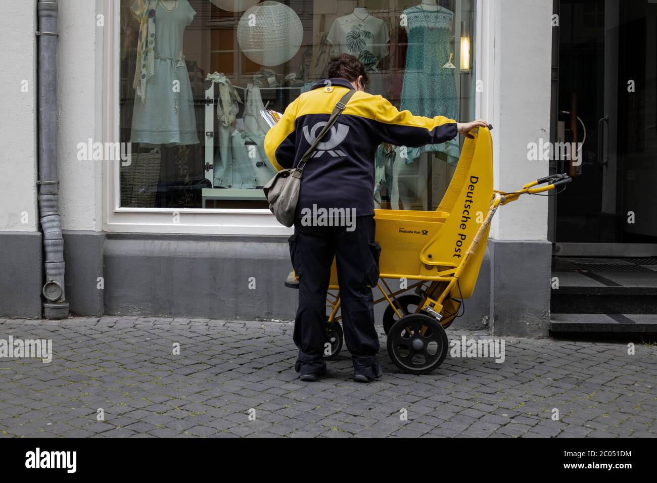 Postal worker, Braunschweig, Germany Stock Photo