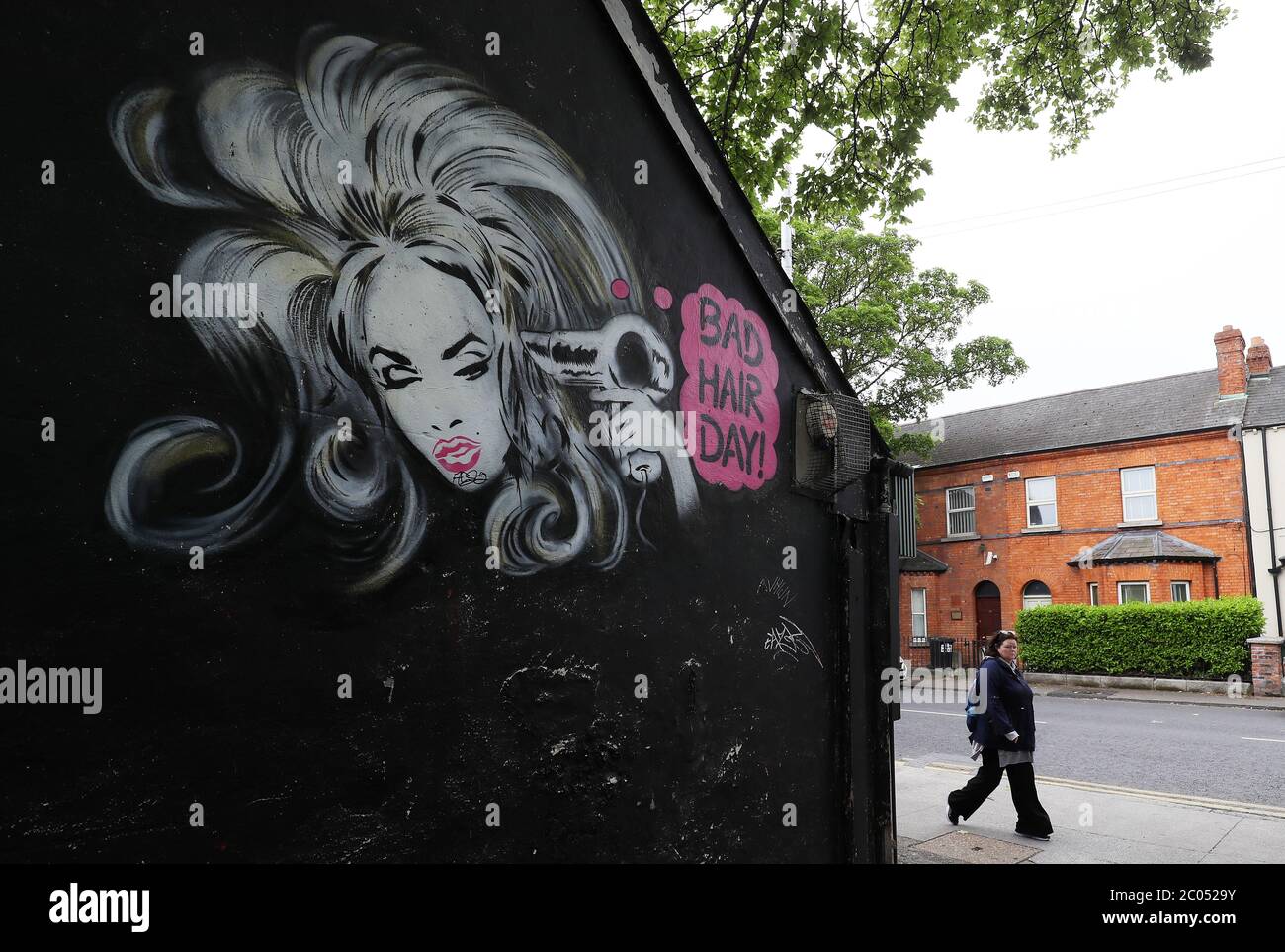 A mural on the side of a hair salon in Dublin as hairdressers may be
