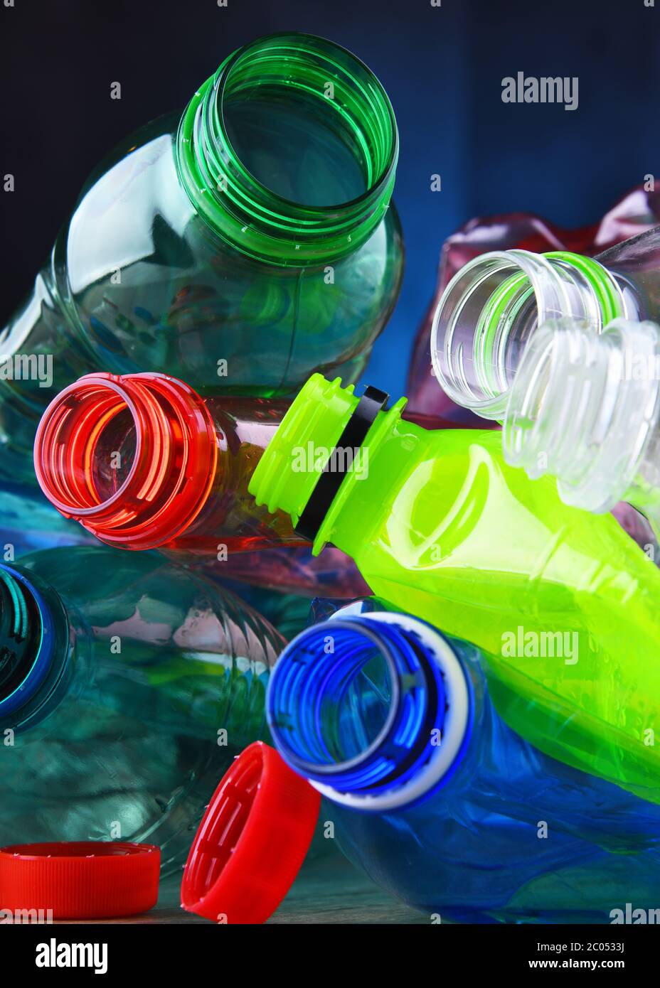 Empty colored carbonated drink bottles. Plastic waste Stock Photo