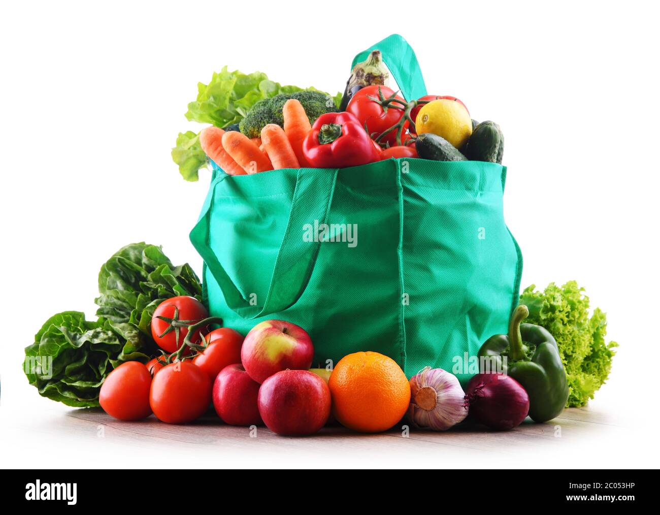 Shopping bag with vegetables and fruits on white background Stock Photo