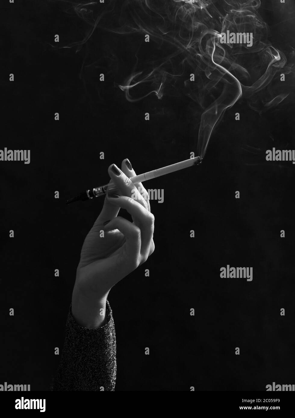Hand with a cigarette Stock Photo