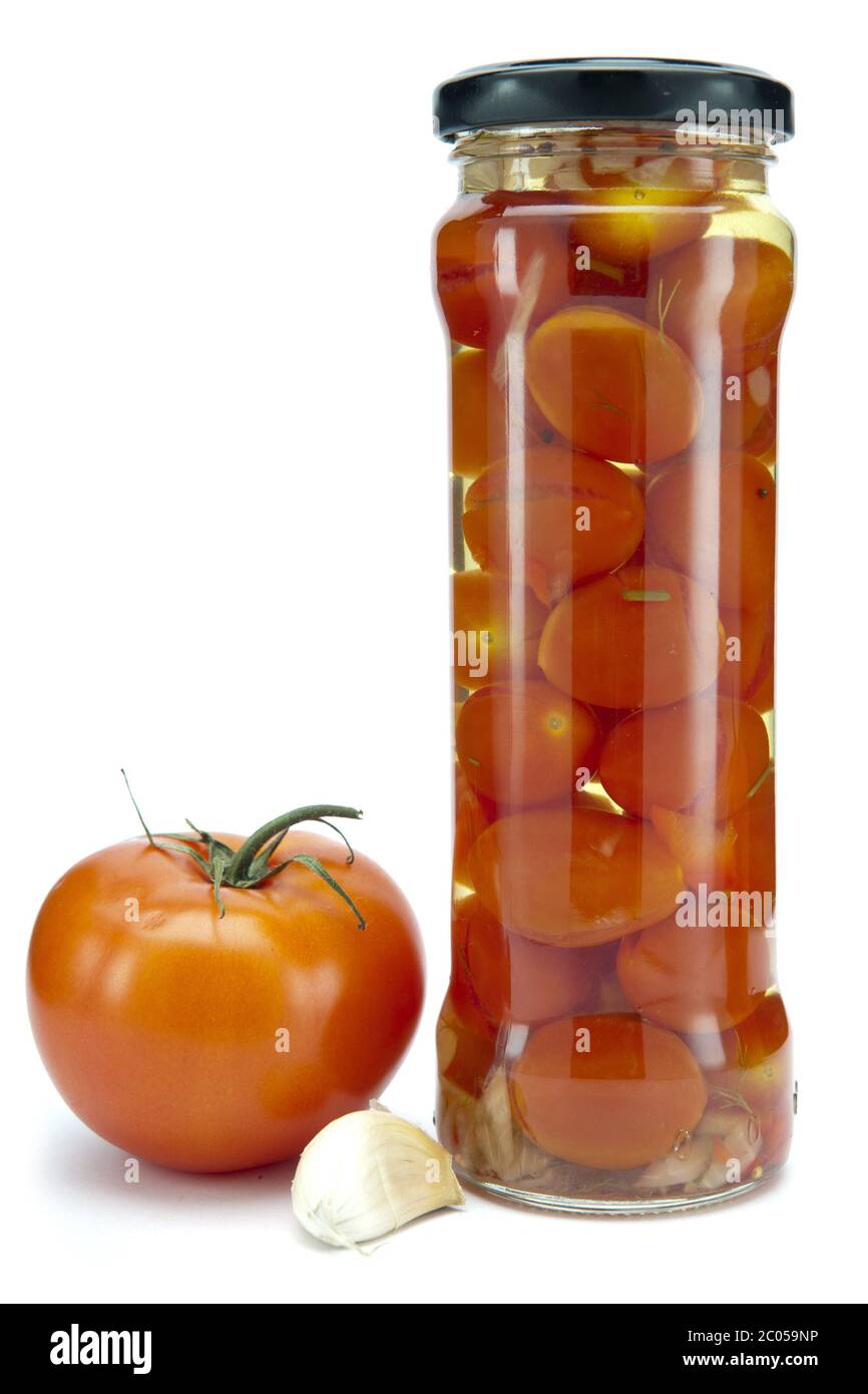 Canned tomatoes in glass jars Stock Photo Alamy