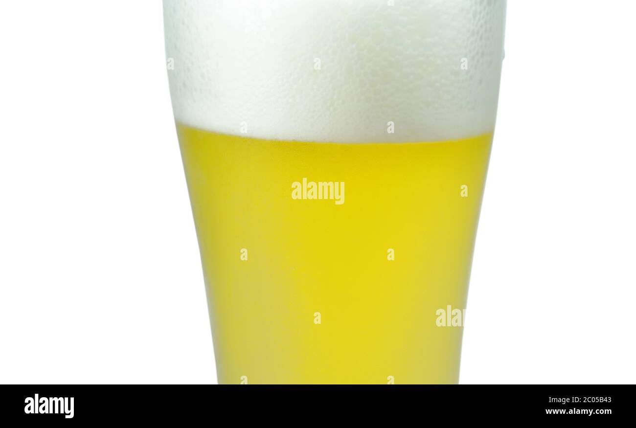 cold beer with frothy in glass on white background Stock Photo