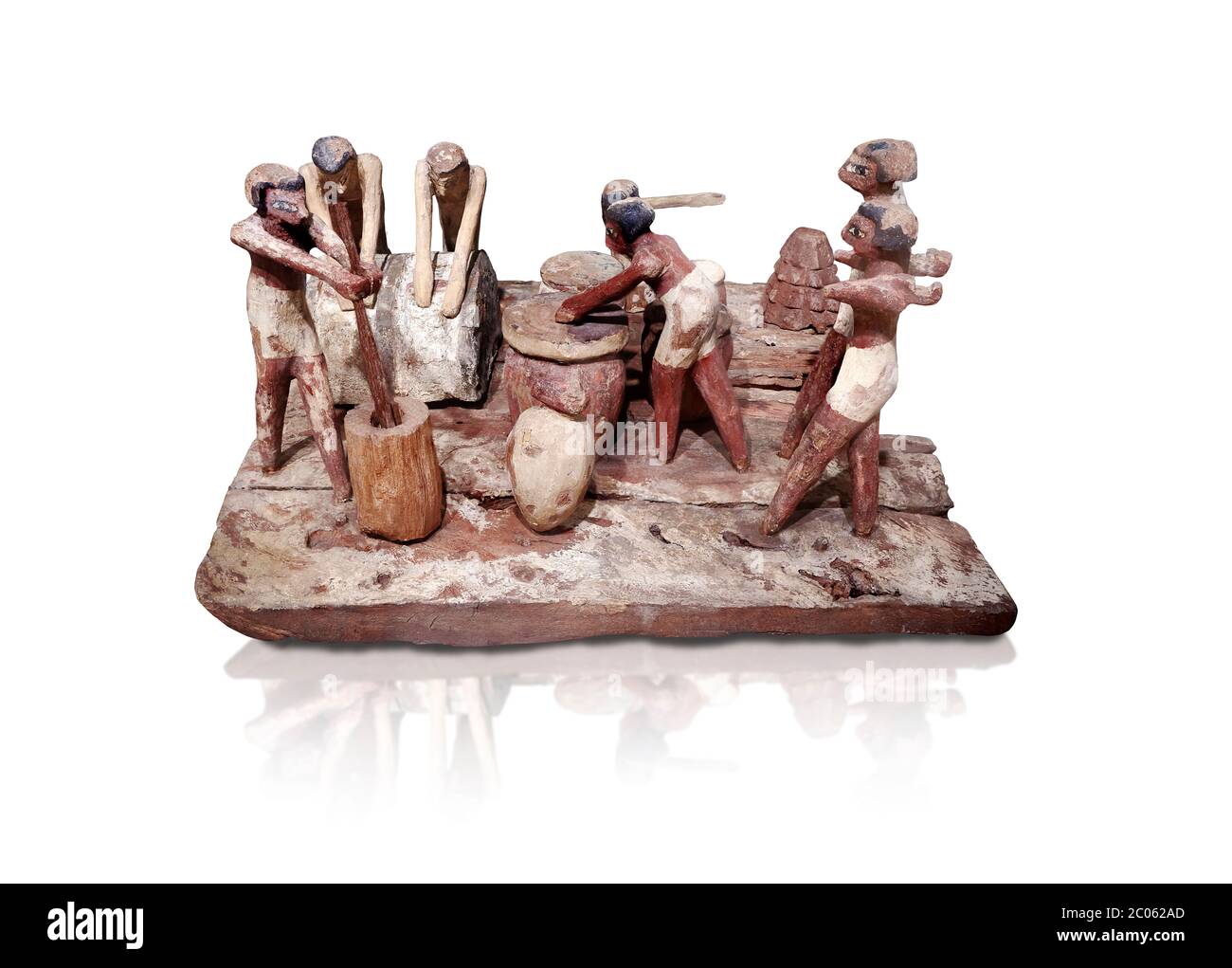 Ancient Egyptian wooden model of bread making, Middle Kingdom, (1939-1875 BC),  Egyptian Museum, Turin. white background.   Wooden tomb models were an Stock Photo