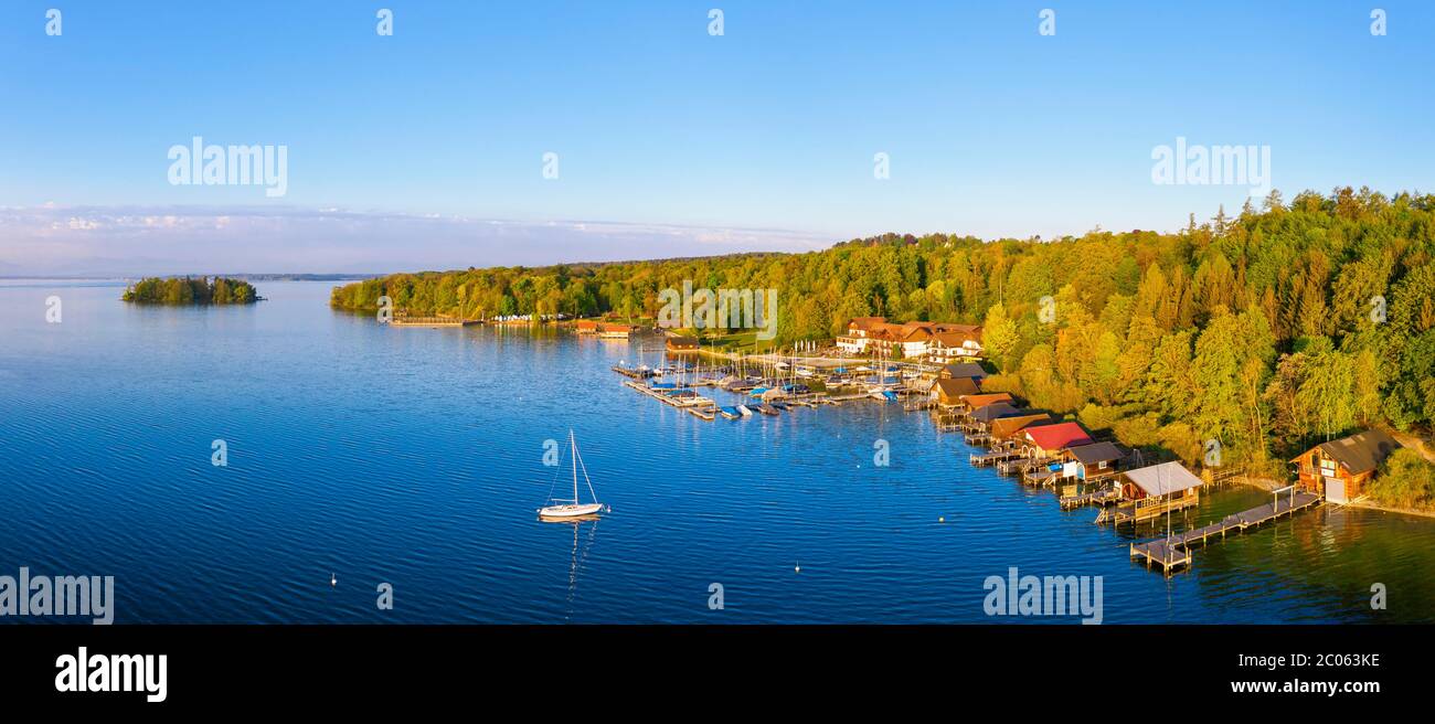 Jetties and boathouses, forester's lodge on the lake, in the back Roseninsel, Starnberger See between Feldafing and Poecking, Fuenfseenland, aerial Stock Photo