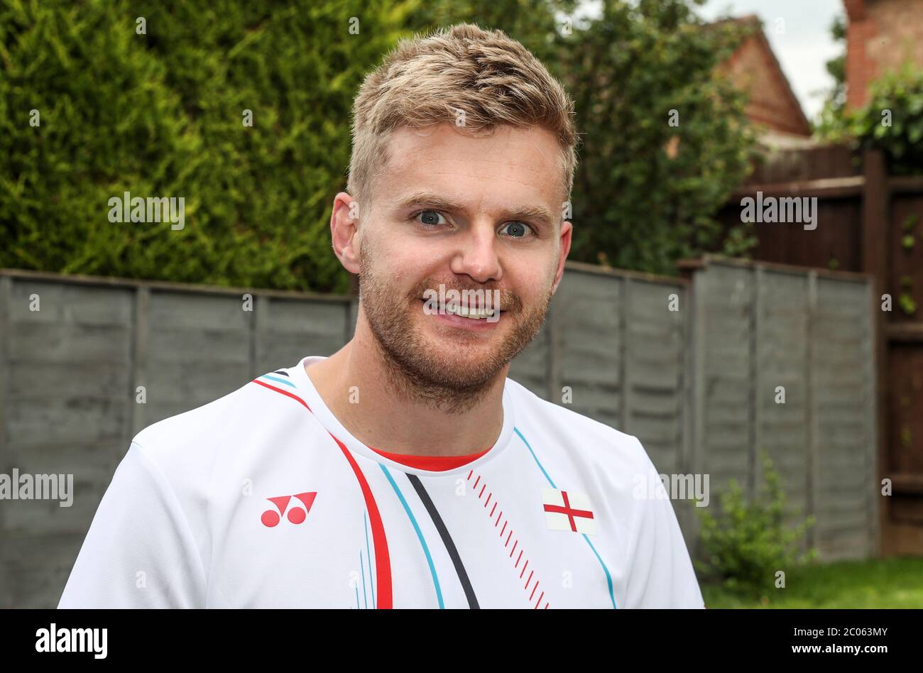 Badminton player Marcus Ellis after practicing in the back garden of his house in Milton Keyne s. Stock Photo