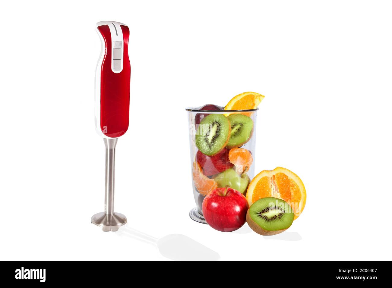 Small electric blender and fresh fruits Stock Photo