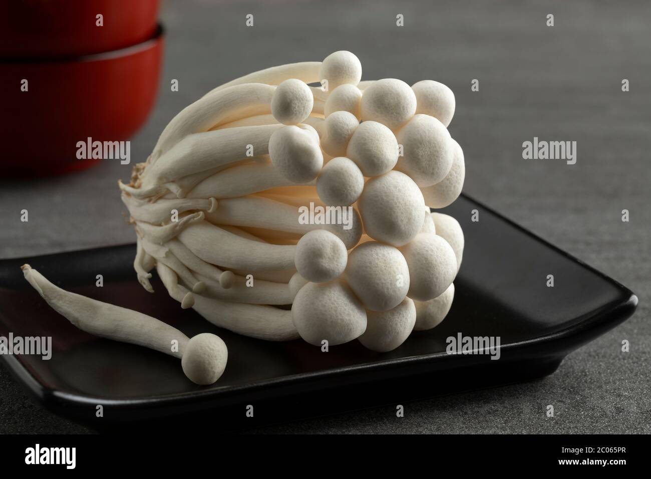 Cluster of fresh white shimeji mushrooms close up Stock Photo