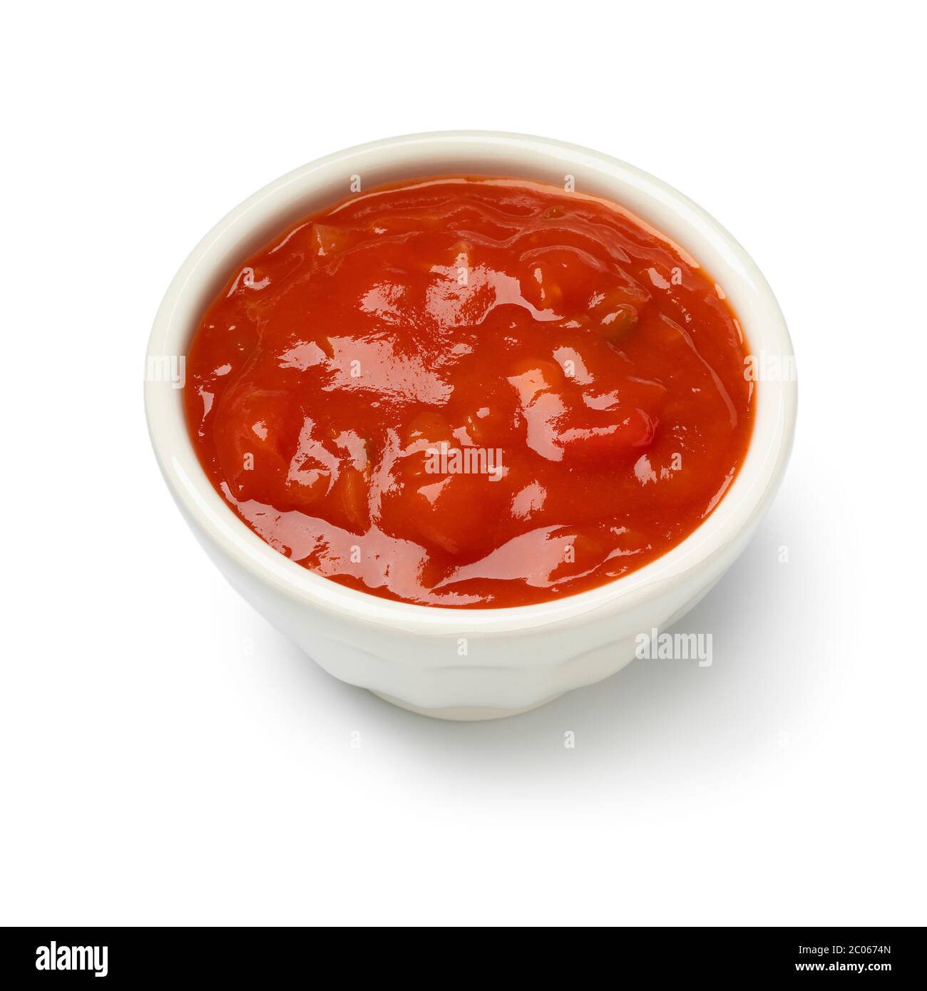 White bowl with red spicy mexican salsa isolated on white background Stock Photo