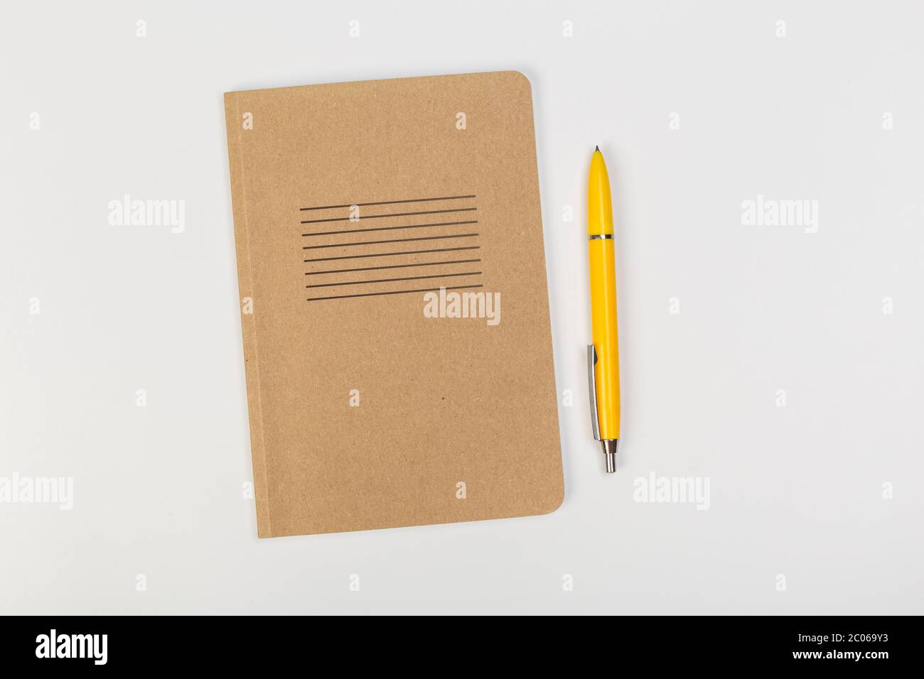 school notebook with pen isolated on white background Stock Photo - Alamy