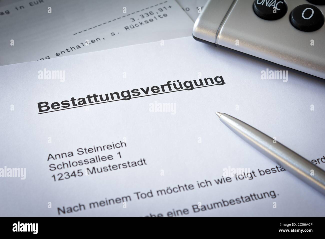 German advance funeral directive paper with bank statement: bestattungsverfügung Stock Photo