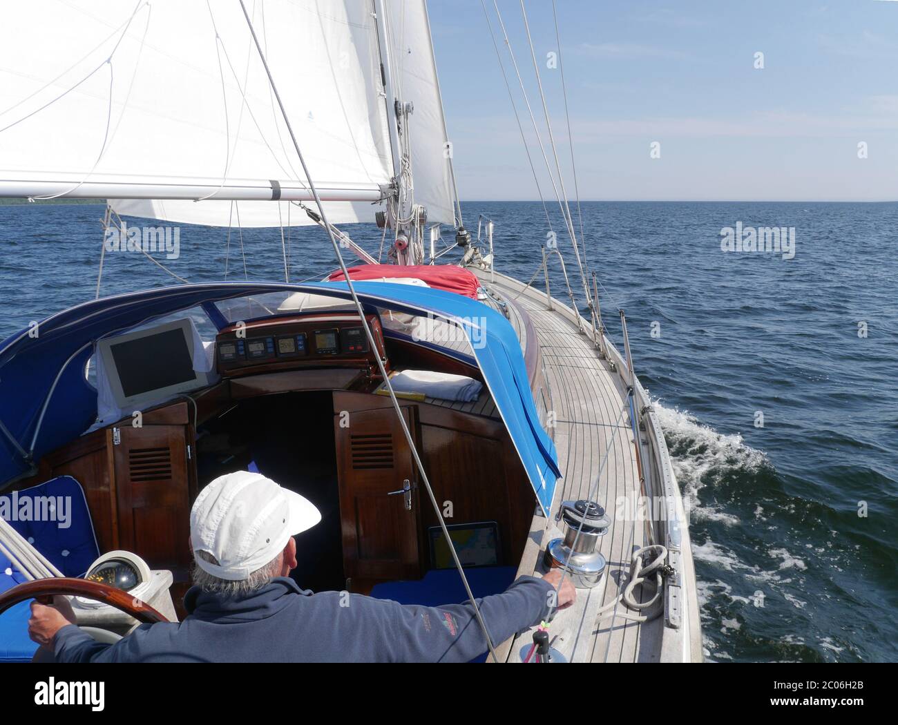 skipper on sailing vessel Stock Photo