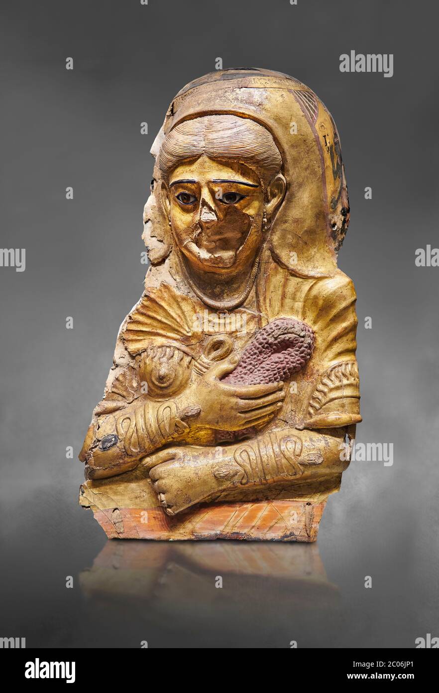Ancient Egyptian Roman female mummy mask, limestone, Roman Period, 2nd Cent AD, Hawara,  Egyptian Museum, Turin. Grey Background  This is a remarkable Stock Photo