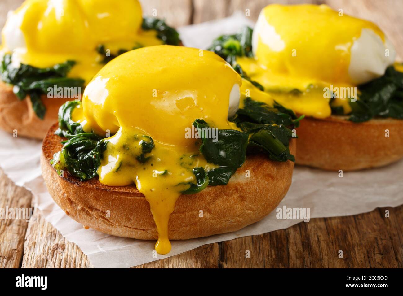Florentine eggs with spinach and hollandaise sauce on a crispy bun