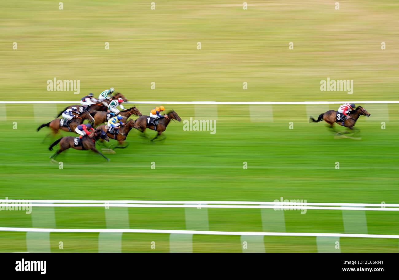 Involved ridden by James Doyle wins The MansionBet's Beaten By A Head Handicap at Newbury Racecourse. Stock Photo