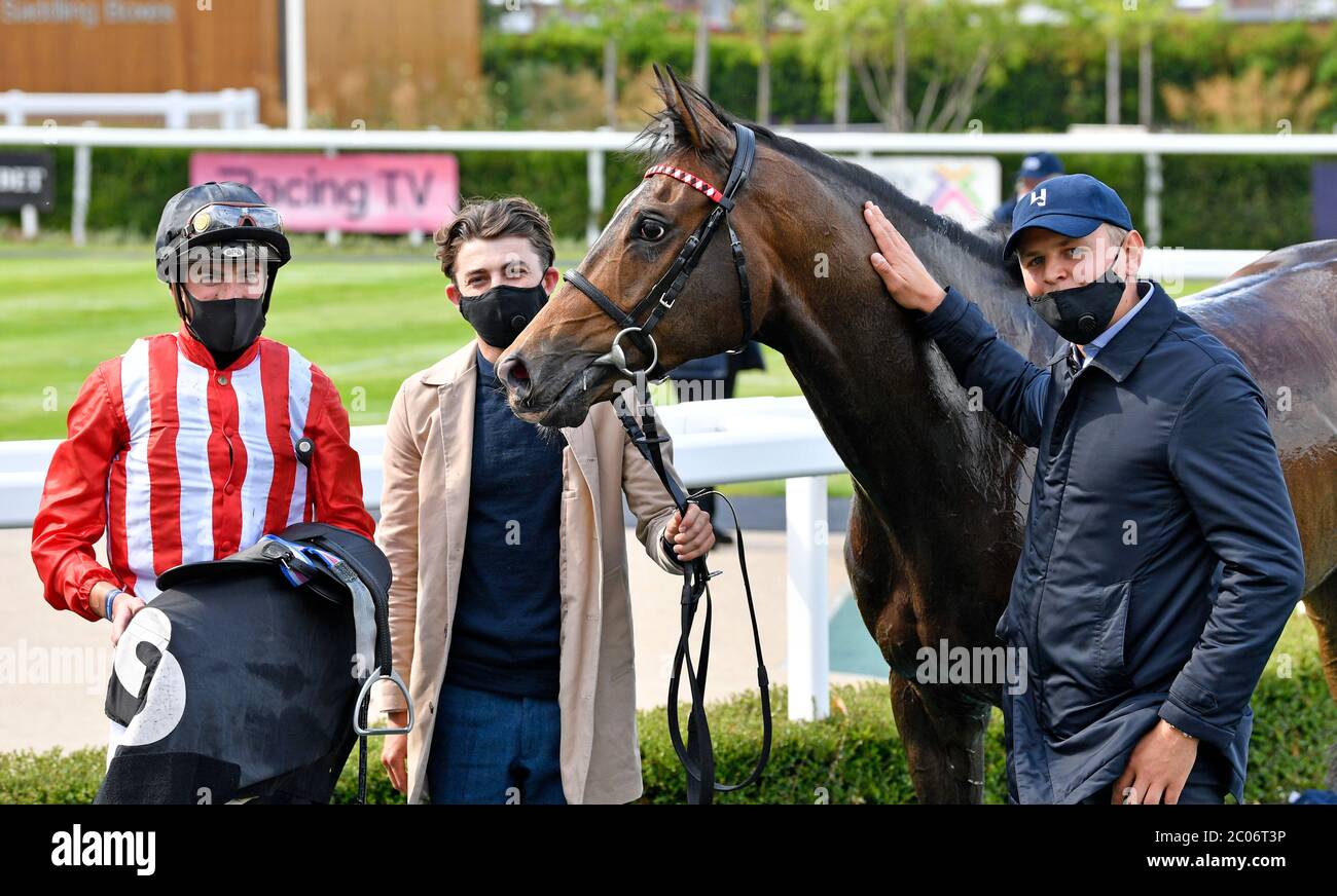 Involved and James Doyle after winning the MansionBet’s Beaten by a Head Handicap at Newbury Racecourse. Stock Photo