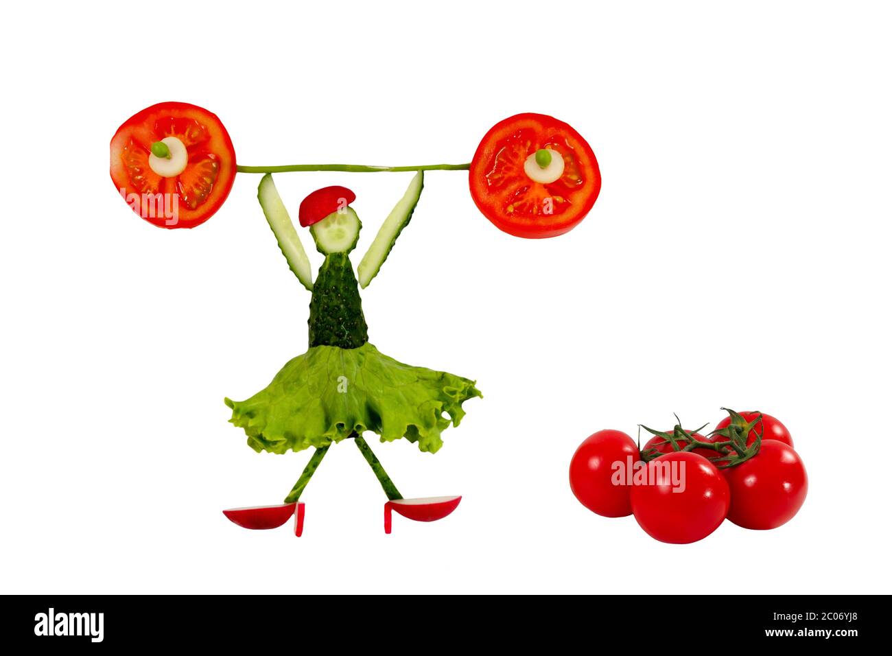 Healthy eating. Funny little woman of the cucumber slices raises tomato bar. Stock Photo