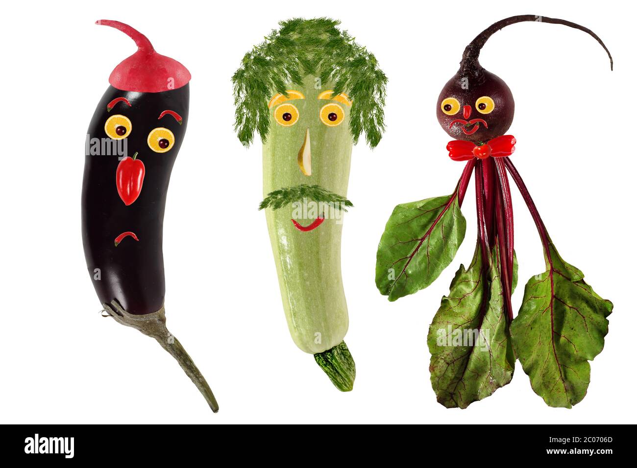 Funny portraits made ??of beets, eggplant and zucchini Stock Photo