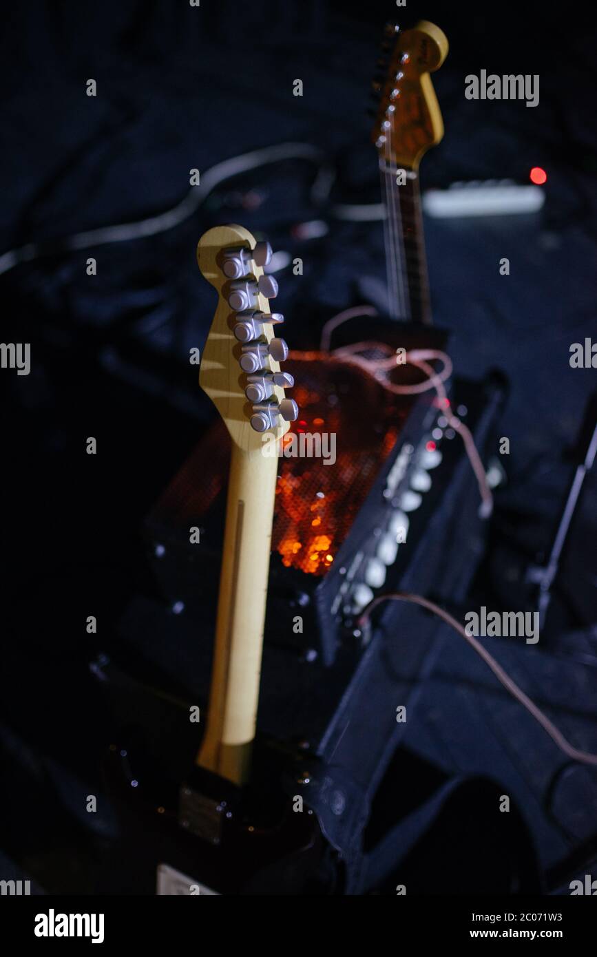 Back view of electric guitar on stage. Stock Photo