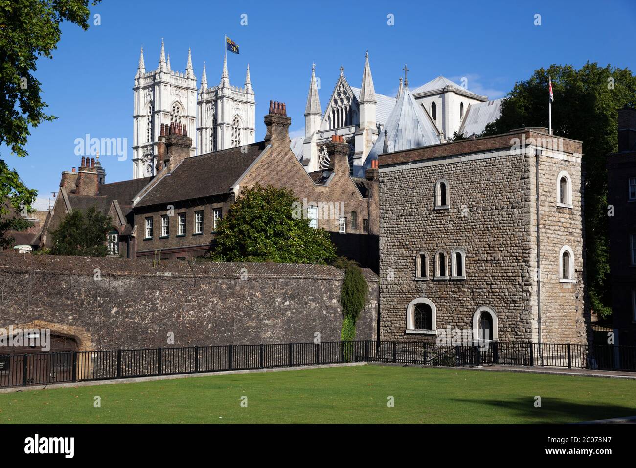 Westminster Abbey and the Jewel Tower along Abingdon Street, London, England, UK Stock Photo