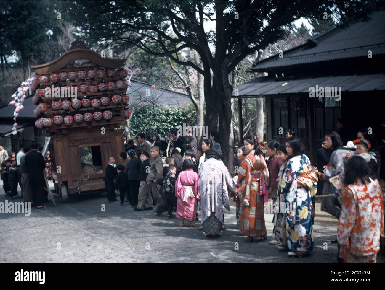 [ 1950s Japan - Japanese Festival Float ] — A danjiri festival float pulled by children at a matsuri (religious festival), ca. 1950 (Showa 25).  20th century vintage slide film. Stock Photo