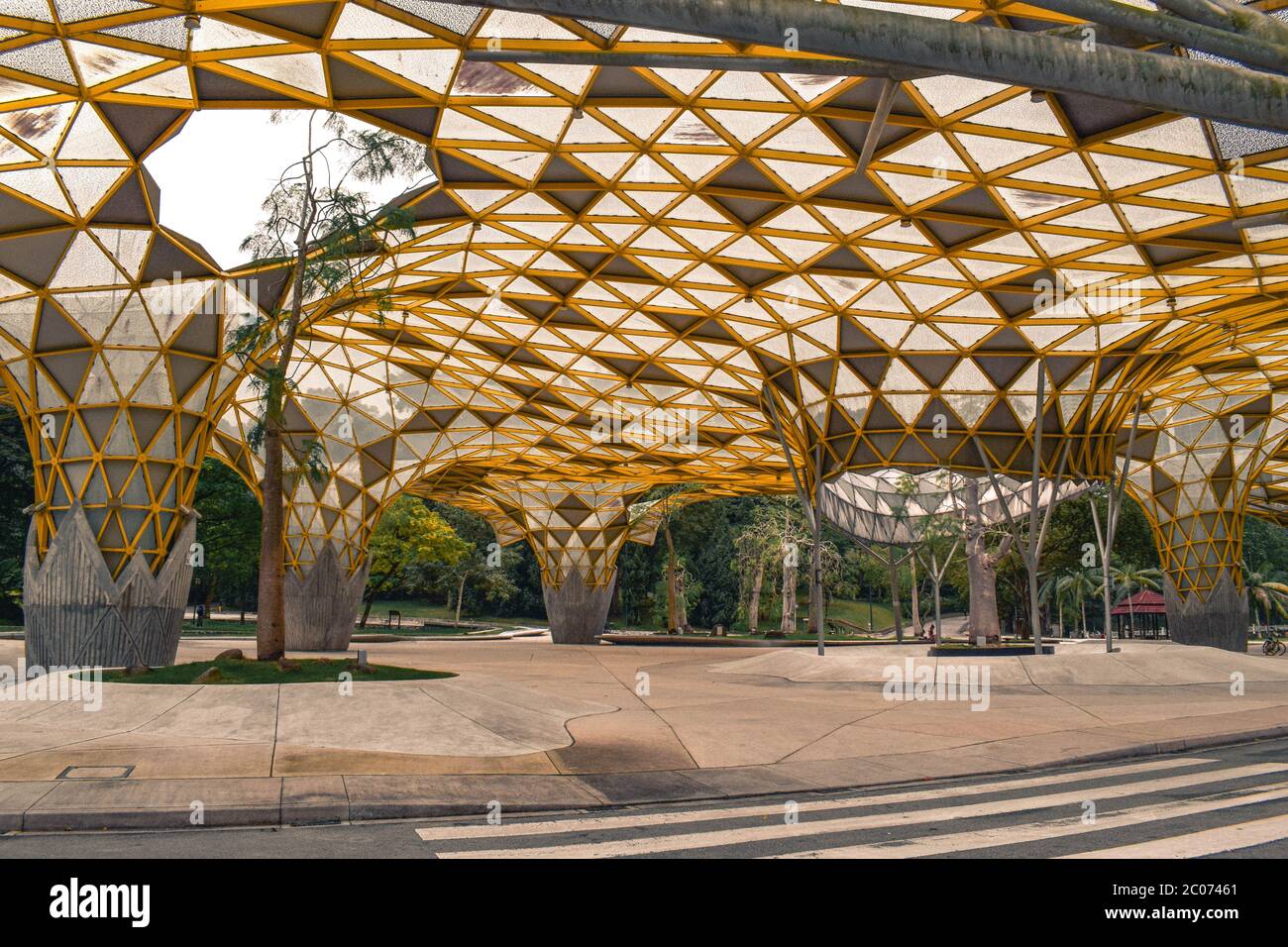 The artsy yellow cover roof in the Perdana Botanic Garden in Kuala Lumpur Malaysia Stock Photo
