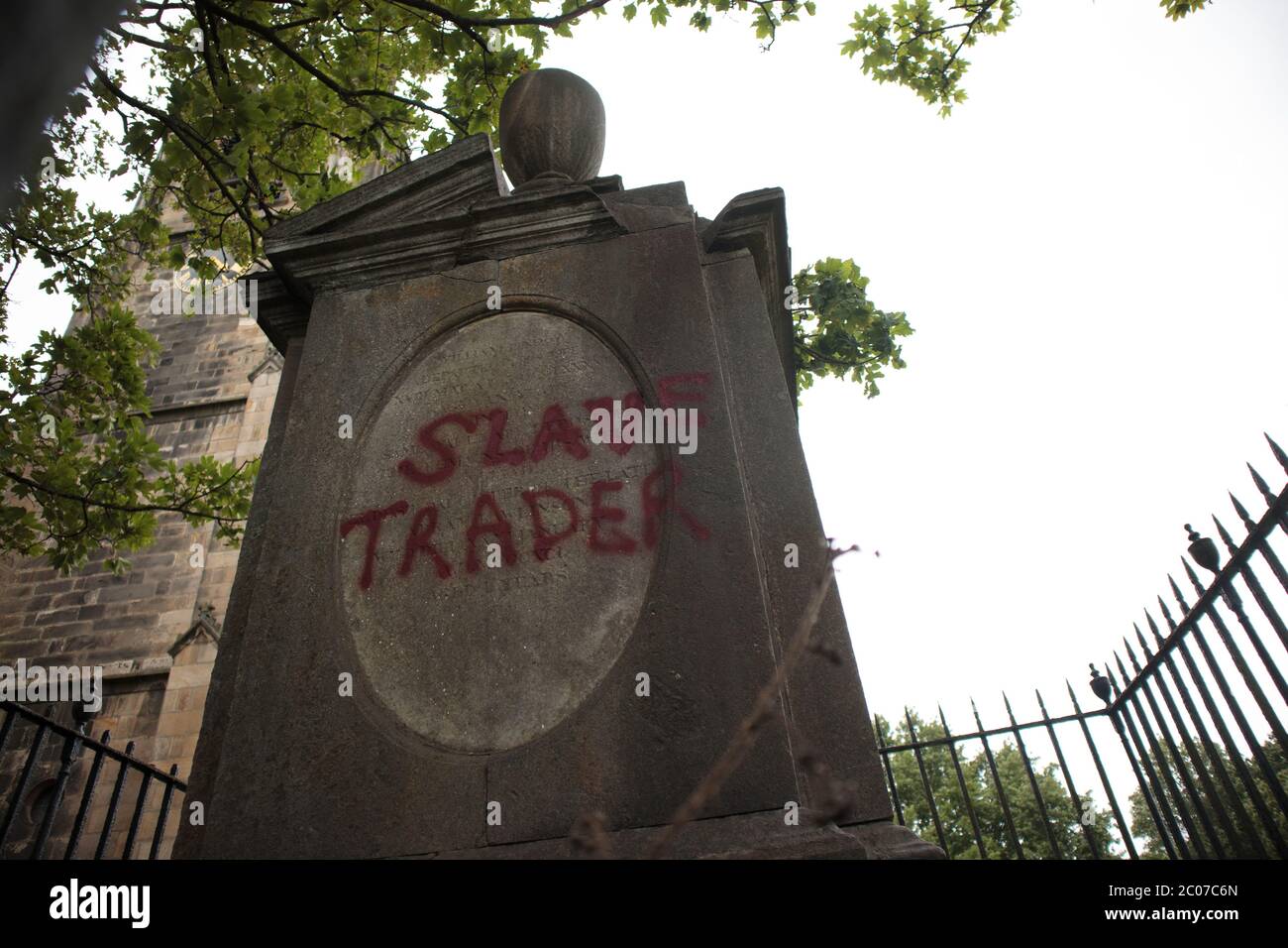 Lancaster, United Kingdom 11th June 2020, Whilst many monuments have been cleaned up following Black Lives Matter in the UK the Graffiti remains on the Rawlinson Family Vault in Lancaster, The Rev Chris Newlands, Vicar of Lancaster, has described the way in which vast sums of money were made during the slave trade as an 'abomination' to the lasting shame and regret, of the City. He said that he was not endorsing the vandalism, but that he understand the righteous anger which made it happen. The monument which is over the Rawlinson Family vault is a part of the history of our city, whether w Stock Photo