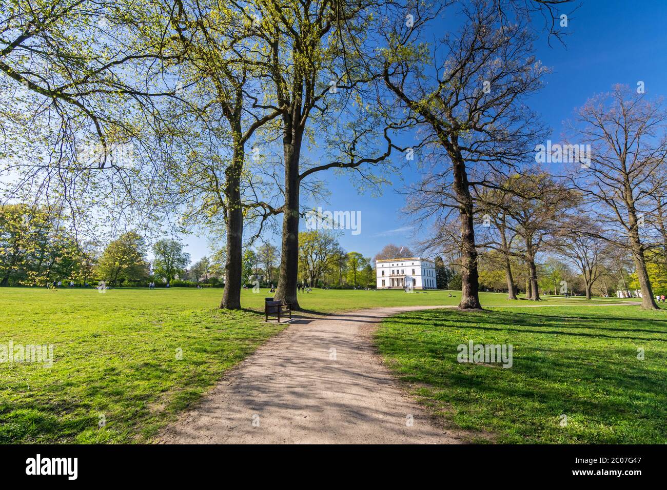 Foot path in a beautiful landscaped park (Jenischpark) in Hamburg, Germany Stock Photo