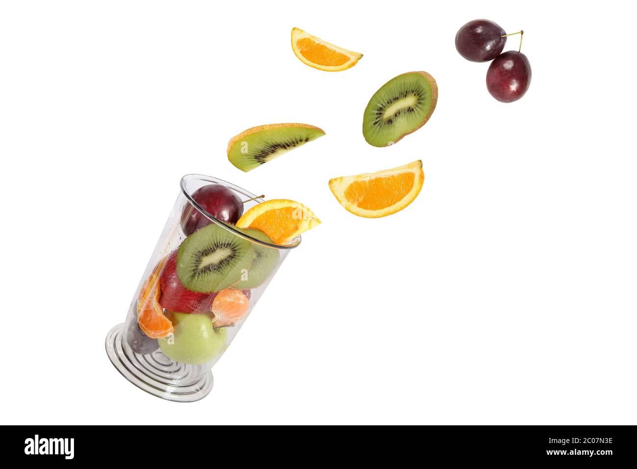 Healthy eating. Various fruit fly in the blender jar. Stock Photo
