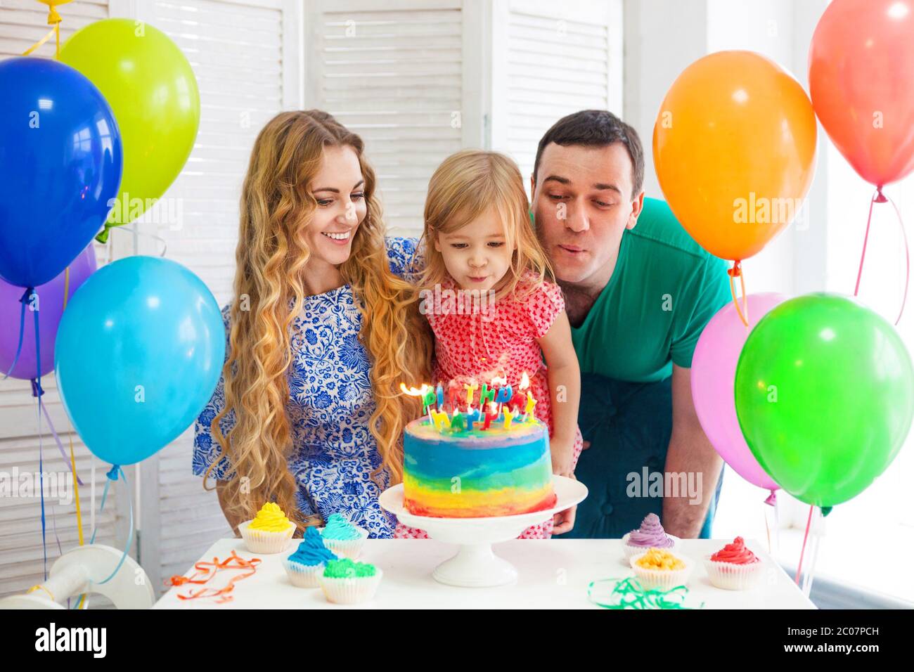 father-and-baby-boy-at-birthday-party-hi-res-stock-photography-and