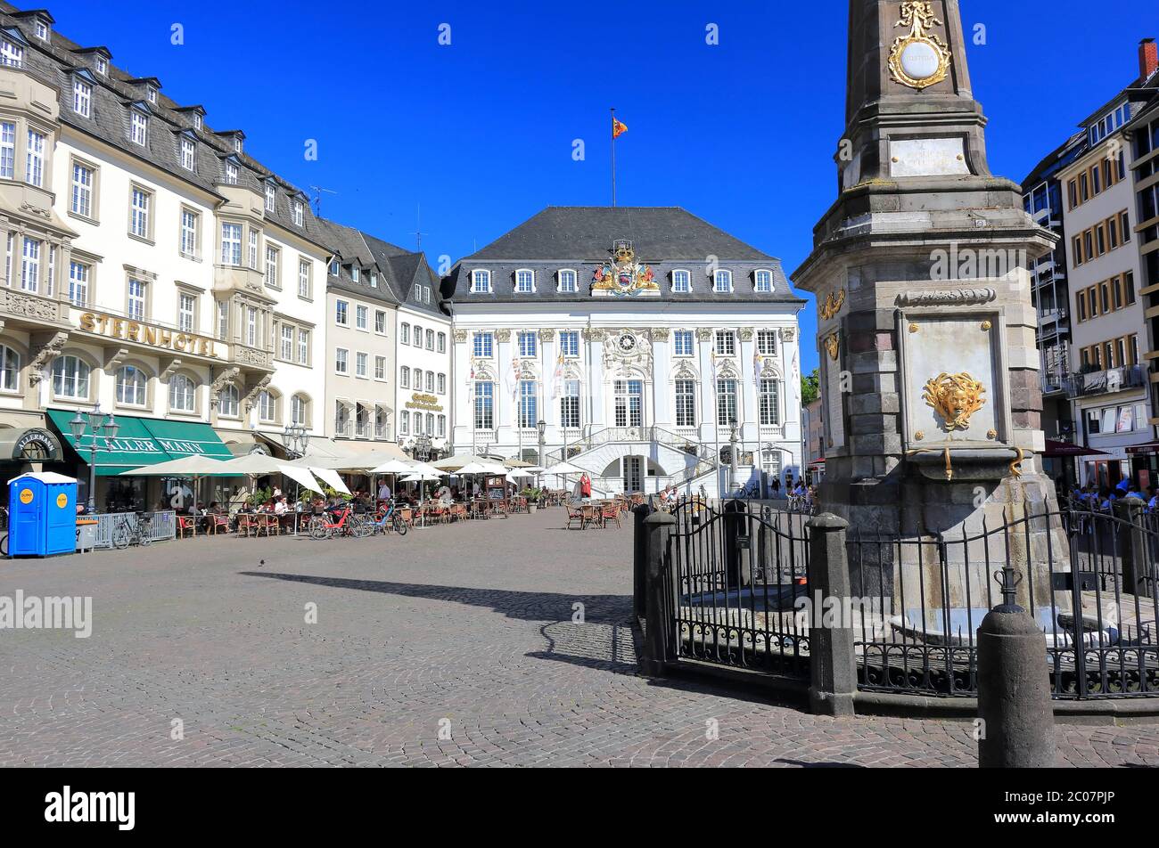 Bonn, Germany – June 11, 2020: Old town hall with unidentified people on a sunny evening in June. It was built in Rococo-style by the court architect Stock Photo