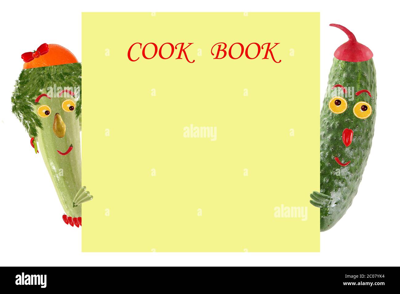 Creative food concept. Funny little zucchini and cucumber look  and smile with sample text. Stock Photo