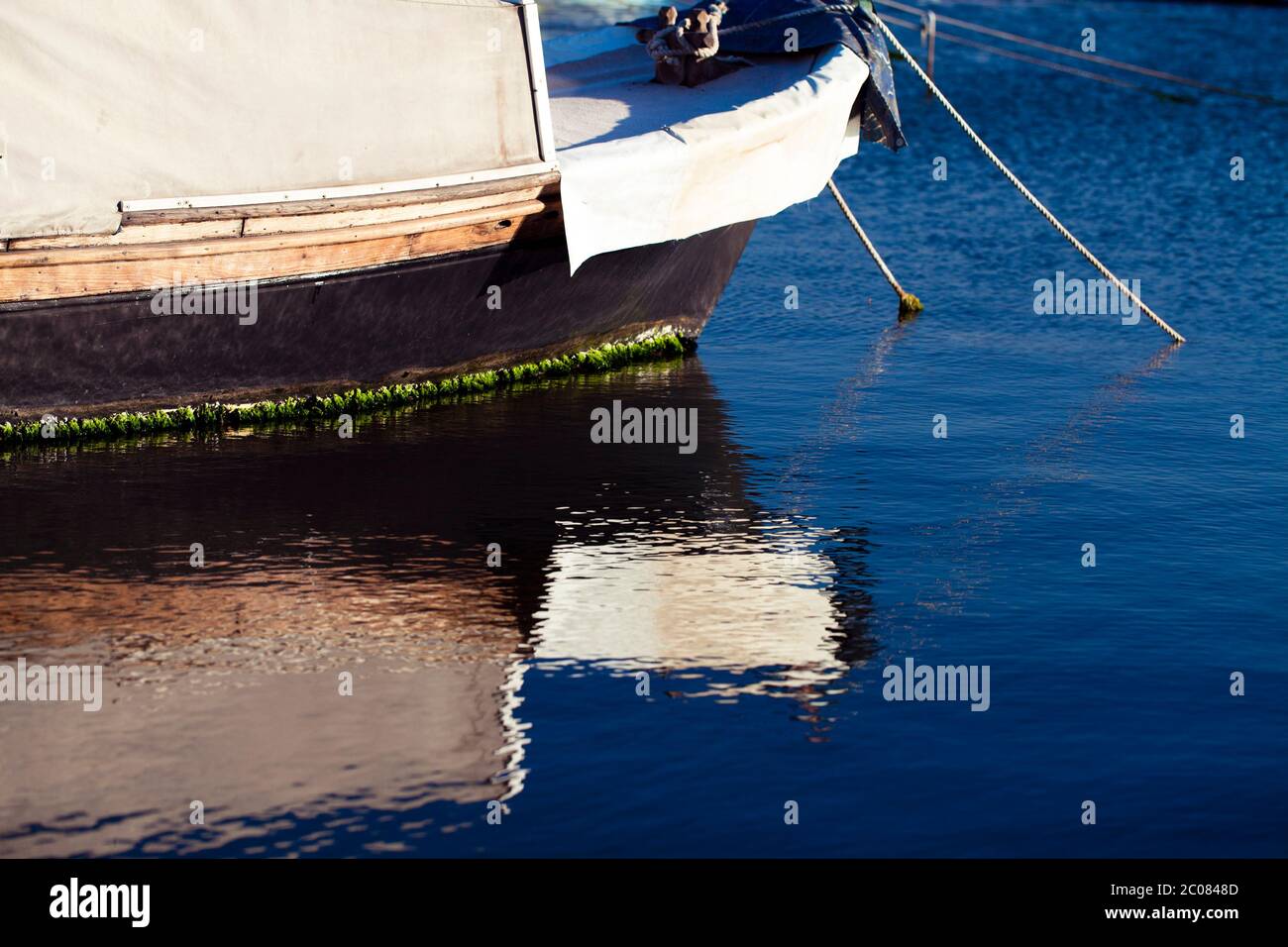 Boat Reflection on the Sea Water Photo Stock Photo - Alamy