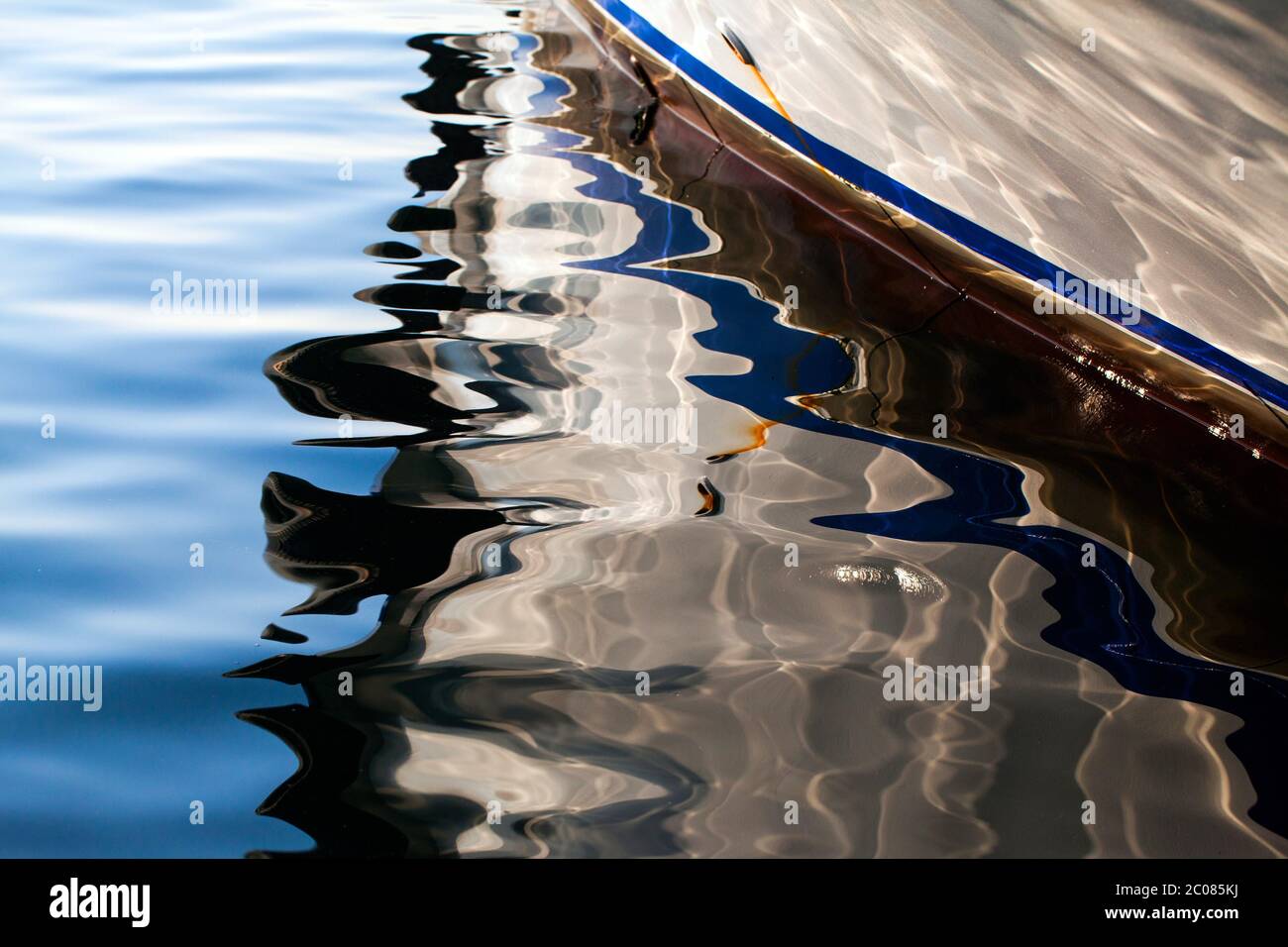 Boat Reflection on the Sea Water Photo Stock Photo - Alamy