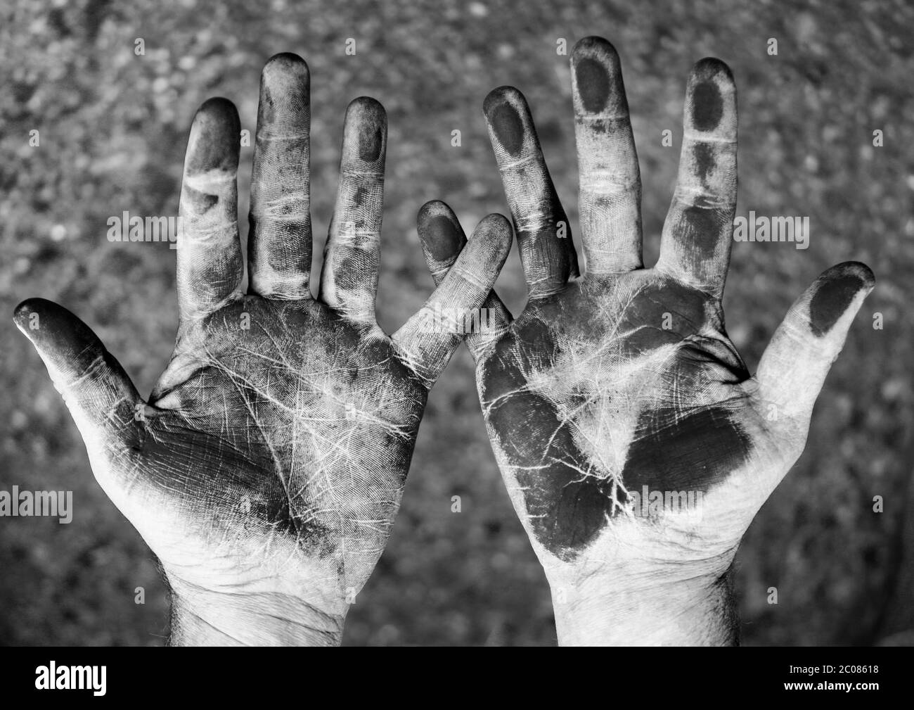 dirty hands on black and white Stock Photo