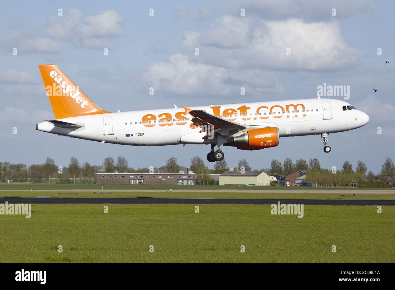 Amsterdam Schiphol Airport - EasyJet Airbus A320 lands Stock Photo