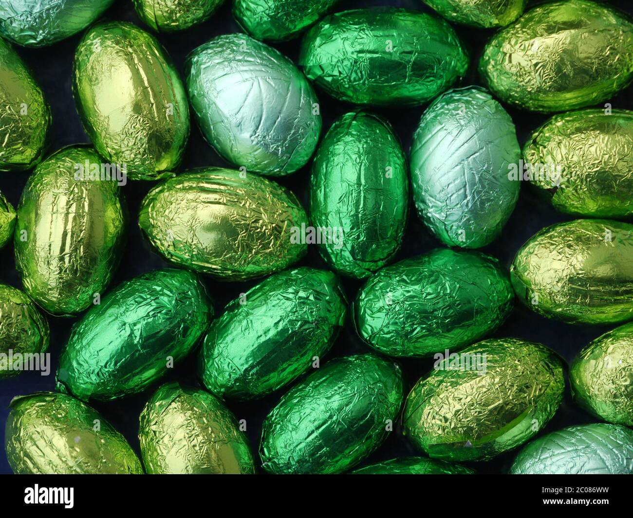 chocolate eggs in green tinfoil Stock Photo Alamy