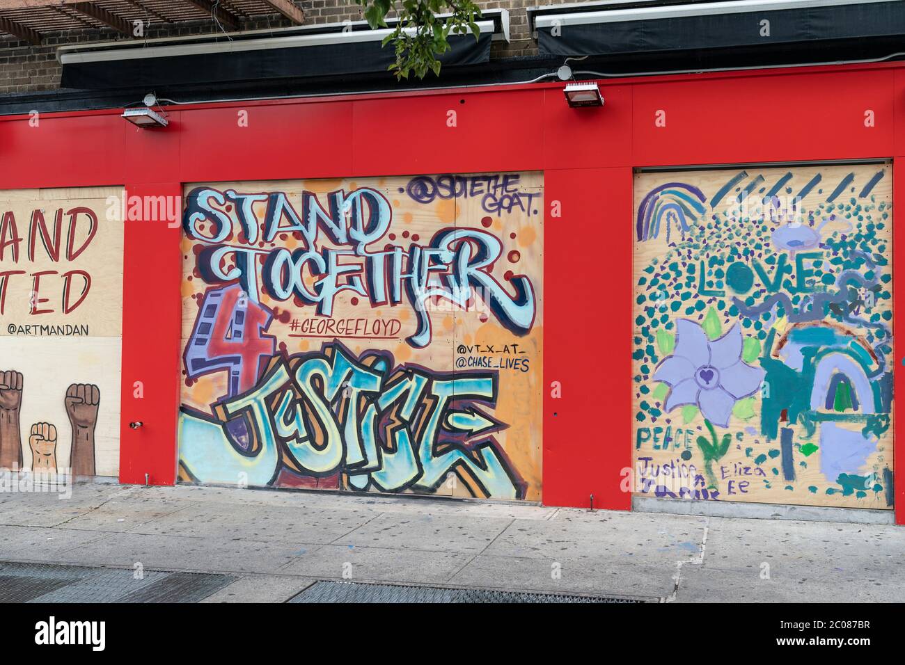 New York, NY - June 11, 2020: Local graffiti artists painted murals on ...