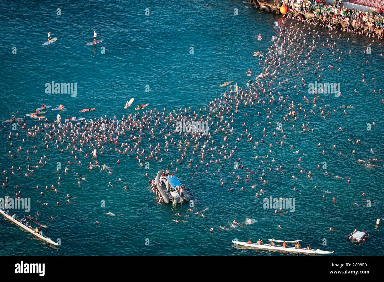 Aerial of Swimmers prepare for swim start of World Championship Ironman Triathlon in Kailua Kona, Hawaii Stock Photo
