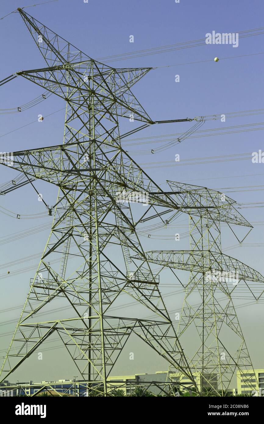 high voltage electric tower line with blue sky background Stock Photo ...