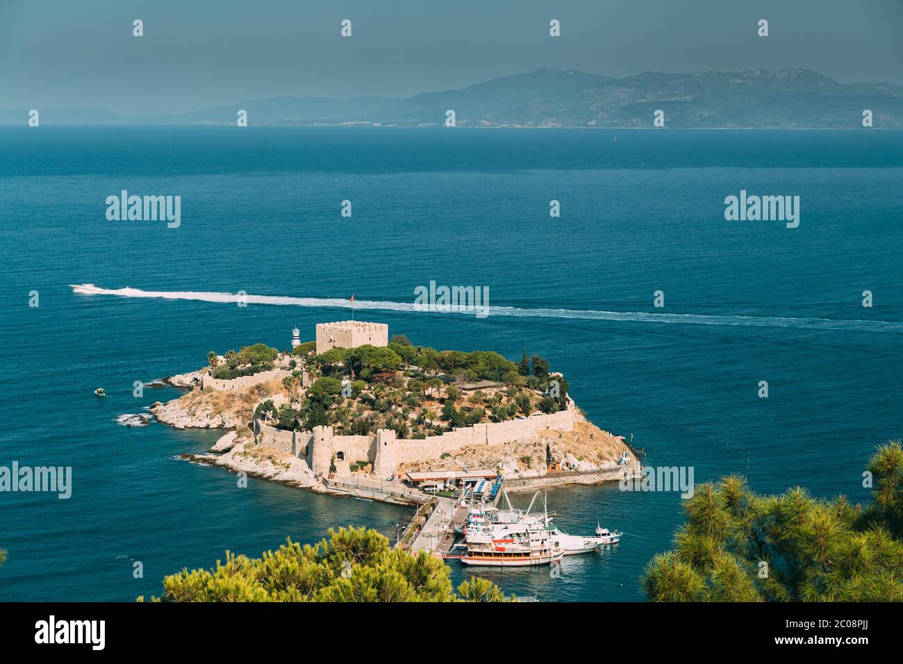 Kusadasi, Aydin Province, Turkey. Top View Of The Pigeon Island. Old 14th-15th Century Fortress On Guvercin Adasi In The Aegean Sea. Bird Island Stock Photo