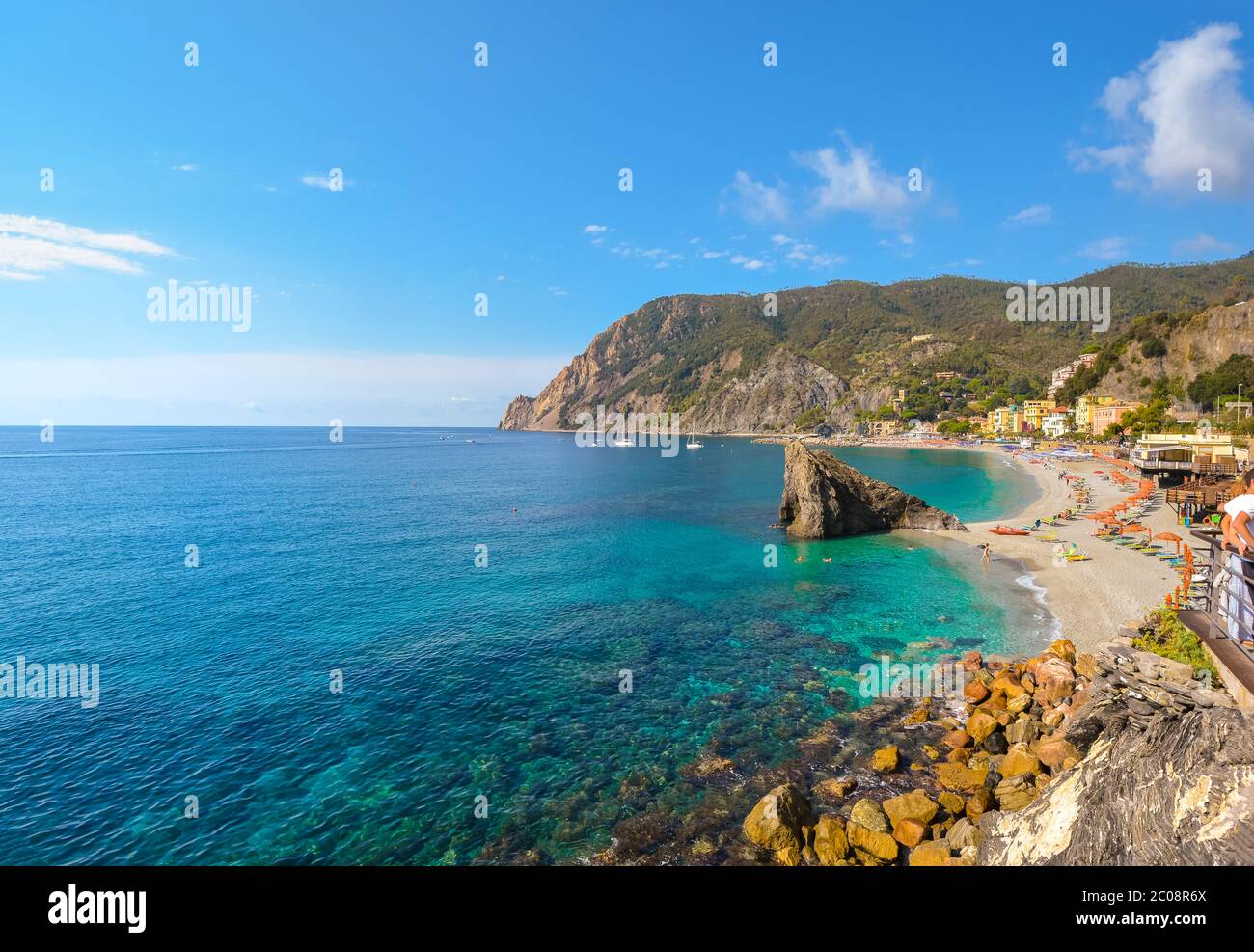 The sandy beach at the Italian village of Monterosso al Mare on the Ligurian coast, part of the Cinque Terre, an Unesco World Heritage Site. Stock Photo