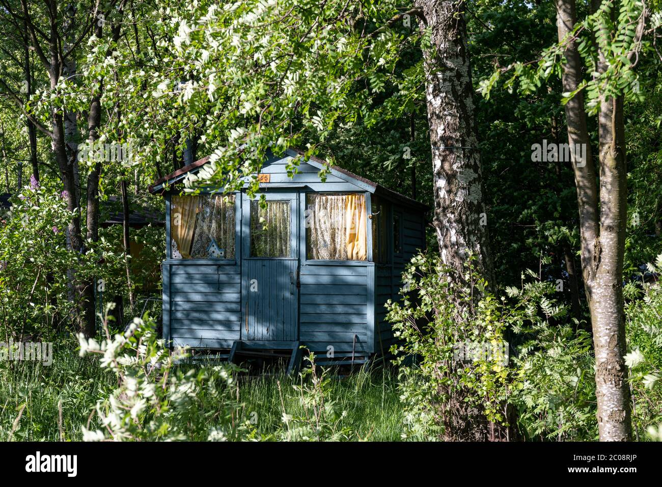 Light blue summer cottage or summer hut in Kivinokka summer camp area in Helsinki, Finland Stock Photo