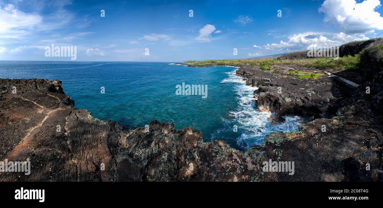 Panorama of Alahaka Bay  and lava in Pu’uhonua O Honaunau National Park with King’s Trail on right in South Kona, Hawaii. Stock Photo